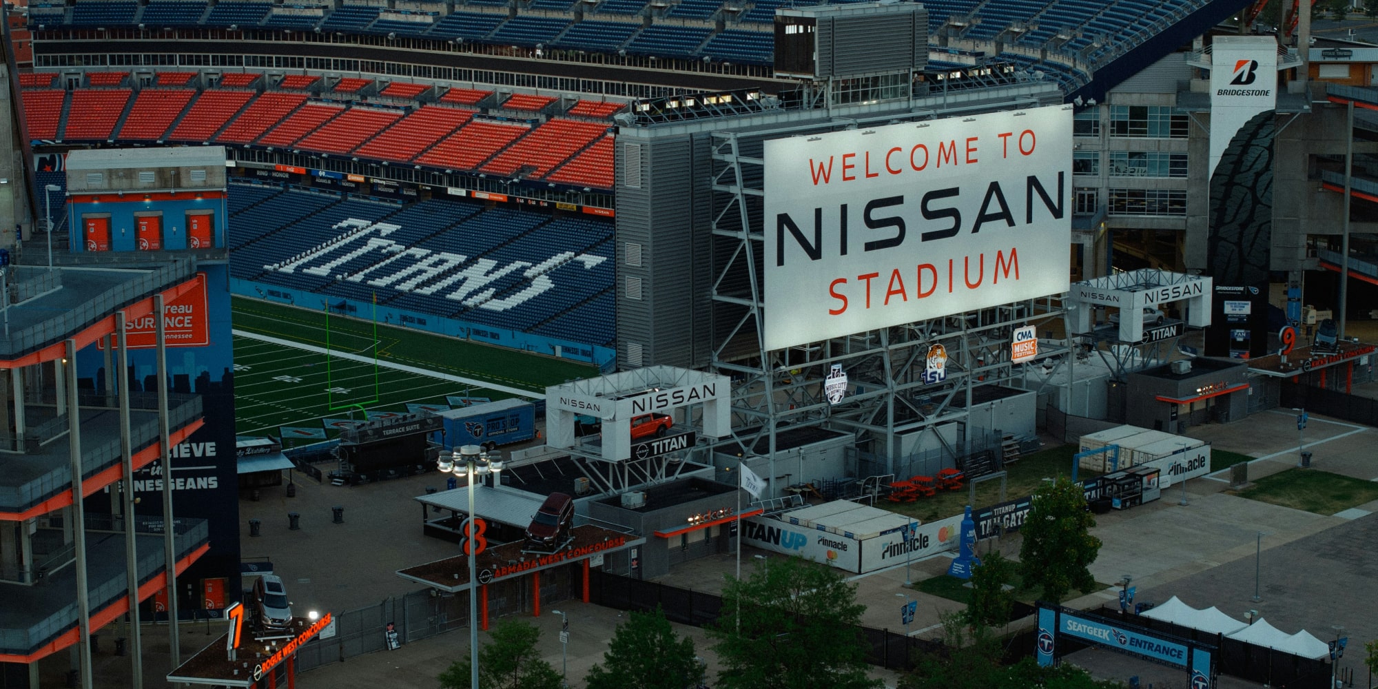 Close-up of the 'Welcome to Nissan Stadium' sign at the entrance of the stadium.